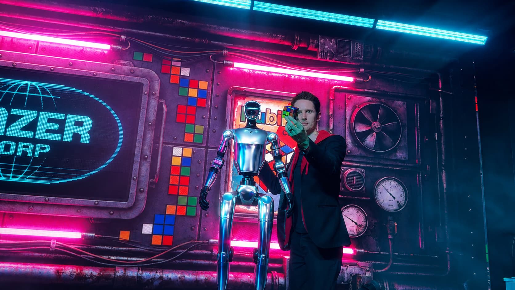 Keelan Leyser on stage with Navitron the robot during the HACKED technology show at Mandalay Bay